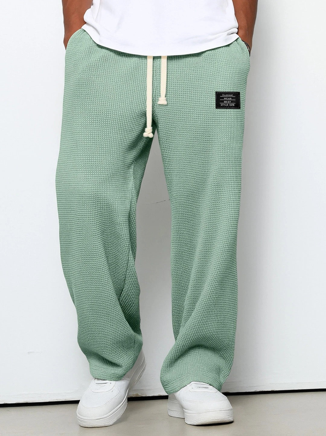 Men's Waffle-Textured Drawstring Trousers with Side Pockets and Wide Legs for Casual Wear
