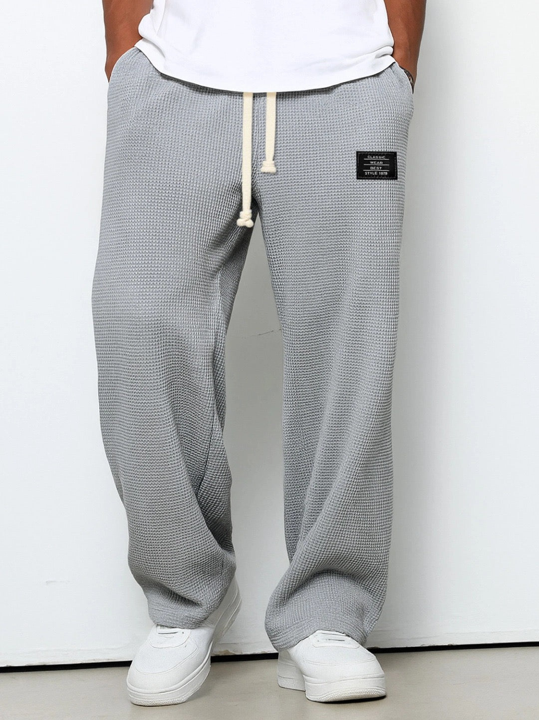 Men's Waffle-Textured Drawstring Trousers with Side Pockets and Wide Legs for Casual Wear