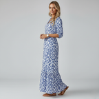 Women's V-Neck Maxi Dress in Printed Fabric with Tiered Hem and Half Sleeves for Casual or Formal Occasions