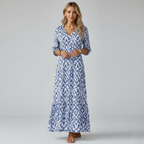 Women's V-Neck Maxi Dress in Printed Fabric with Tiered Hem and Half Sleeves for Casual or Formal Occasions